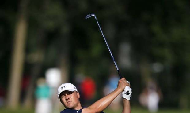 Jordan Spieth watches his approach shot on the 11th hole during the second round of the John Deere ...
