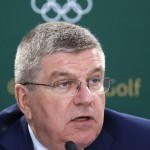 
              International Olympic Committee president Thomas Bach speaks during a news conference during the second round of the British Open Golf Championship at the Old Course, St. Andrews, Scotland, Saturday, July 18, 2015. Golf will feature at the Rio 2016 Olympics. (AP Photo/Jon Super)
            