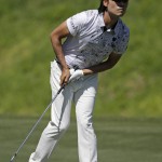 
              Kevin Na follows his shot from the seventh fairway, during the second round of The Players Championship golf tournament Friday, May 8, 2015, in Ponte Vedra Beach, Fla. (AP Photo/Chris O'Meara)
            