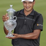 
              Fabian Gomez, of Argentina, poses with his trophy after winning the St. Jude Classic golf tournament Sunday, June 14, 2015, in Memphis, Tenn. (AP Photo/Mark Humphrey)
            