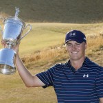 
              Jordan Spieth holds up the trophy after winning the final round of the U.S. Open golf tournament at Chambers Bay on Sunday, June 21, 2015 in University Place, Wash. (AP Photo/Matt York)
            