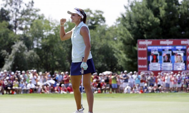 Lexi Thompson pumps her fist after winning the Meijer LPGA Classic golf tournament Sunday, July 26,...