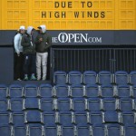 
              A scoreboard near the 18th hole announces that play has been suspended due to high winds during the second round of the British Open Golf Championship at the Old Course, St. Andrews, Scotland, Saturday, July 18, 2015. Play was suspended on Saturday as high winds caused players golf balls to move on some greens.  (AP Photo/Jon Super)
            