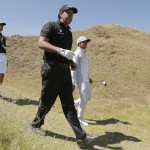 
              Rickie Fowler, right, and Phil Mickelson walk on the 11th hole during a practice round for the U.S. Open golf tournament at Chambers Bay on Tuesday, June 16, 2015 in University Place, Wash. (AP Photo/Charlie Riedel)
            