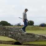 
              United States’ Jordan Spieth walks across Swilcan Bridge during a practice round at the British Open Golf Championship at the Old Course, St. Andrews, Scotland, Tuesday, July 14, 2015. (AP Photo/Jon Super)
            