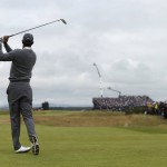 
              United States’ Tiger Woods tees off from the seventh hole during the first round of the British Open Golf Championship at the Old Course, St. Andrews, Scotland, Thursday, July 16, 2015. (AP Photo/Peter Morrison)
            