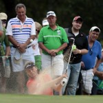 
              Bernhard Langer hits out of the bunker on the 17th hole during the Regions Tradition Champions Tour golf tournament at Shoal Creek Country Club, Friday, May 15, 2015, in Birmingham, Ala. (AP Photo/Butch Dill)
            