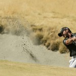 
              Jason Day, of Australia, hits out of the bunker on the sixth hole during the final round of the U.S. Open golf tournament at Chambers Bay on Sunday, June 21, 2015 in University Place, Wash. (AP Photo/Charlie Riedel)
            