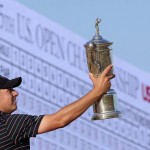 
              FILE - In this Sunday, June 21, 2015, file photo, Jordan Spieth poses with the trophy after winning the U.S. Open golf tournament at Chambers Bay in University Place, Wash. Spieth loves golf history, which is appropriate for someone quickly becoming part of it. He is halfway home to the Grand Slam.  (AP Photo/Charlie Riedel, File)
            