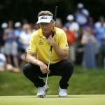 
              Bernhard Langer, of Germany, reads the green on the second hole during the final round of the Senior Players Championship golf tournament in Belmont, Mass., Sunday, June 14, 2015. (AP Photo/Michael Dwyer)
            