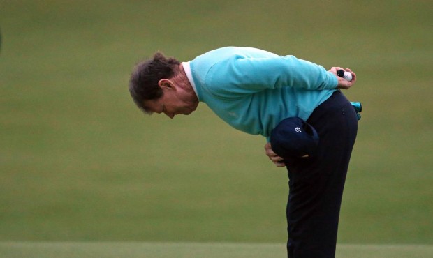 United States’ Tom Watson bows to the crowd after finishing on the 18th green during the seco...