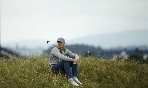 n United States’ Jordan Spieth sits in the rough on hole four during a practice round at the Brit...