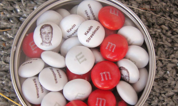 This personalized tin of M&M candies printed with the face and name of 2014 Travelers Golf Cham...