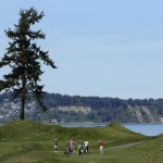 
              FILE - In this April 27, 2015, file photo, a golfer tees off the 16th hole at Chambers Bay golf course in University Place, Wash. Chambers Bay will host the 115th U.S. Open golf tournament next week, but the course is a mystery to the majority of the players because it opened only eight years ago. (AP Photo/Ted S. Warren, file)
            