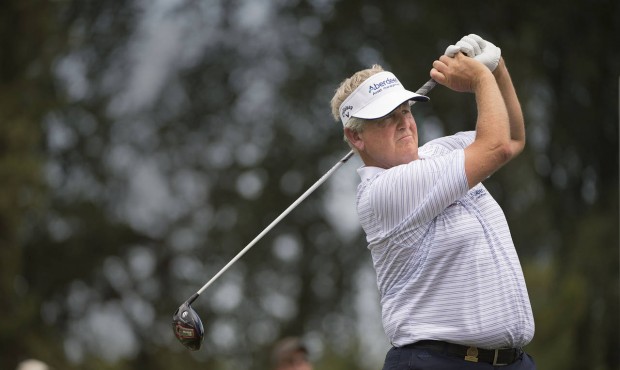 Colin Montgomerie watches his tee shot on the 15th hole during the third round of the U.S. Senior O...