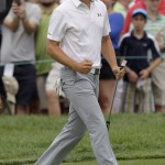 
              Jordan Spieth reacts after making birdie on the 18th hole during the final round of the Memorial golf tournament Sunday, June 7, 2015, in Dublin, Ohio. (AP Photo/Jay LaPrete)
            