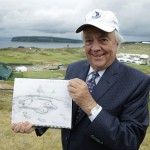 
              In this June 2, 2015, photo, Robert Trent Jones Jr., designer of the Chambers Bay golf course, poses for a photo holding one of his original sketches of the 15th hole in University Place, Wash. A decade ago, the property was an old sand and gravel pit, but next week, the course, which opened in 2007, will become the youngest golf course to host the U.S. Open since Hazeltine in 1970. (AP Photo/Ted S. Warren)
            