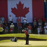 
              David Hearn, of Canada, putts on the 18th green during second round of play at the Canadian Open golf tournament in Oakville, Ontario, Friday, July 24, 2015. (Paul Chiasson/The Canadian Press via AP)
            