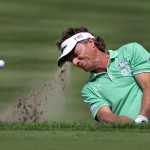 
              Bernhard Langer hits out of a bunker on 16 during the first round of the Senior Players Championship golf tournament, Thursday, June 11, 2015, in Belmont, Mass. (Barry Chin/The Globe via AP)
            