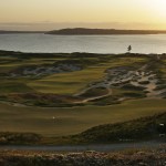 
              In this April 29, 2015, photo, Chambers Bay golf course is shown at sunset in University Place, Wash. Chambers Bay will host the 115th U.S. Open golf tournament next week, but the course is a mystery to the majority of the players because it opened only eight years ago. (AP Photo/Ted S. Warren)
            