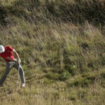 
              Jordan Spieth hits out of the tall fescue grass on the 10th hole during the third round of the U.S. Open golf tournament at Chambers Bay on Saturday, June 20, 2015 in University Place, Wash. (AP Photo/Charlie Riedel)
            