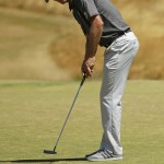 
              Justin Rose, of England, putts on the sixth hole during the second round of the U.S. Open golf tournament at Chambers Bay on Friday, June 19, 2015 in University Place, Wash. (AP Photo/Ted S. Warren)
            