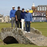 
              From left, Australia’s Ian Baker-Finch, United States’ Todd Hamilton, United States’ Tom Watson, and South Africa’s Louis Oosthuizenduring pose for a photograph on Swilcan Bridge during a special Champion Golfers' challenge at the British Open Golf Championship at the Old Course, St. Andrews, Scotland, Wednesday, July 15, 2015. (AP Photo/Jon Super)
            