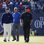 
              From left, United States’ Tom Watson, Australia’s Ian Baker-Finch and United States’ Todd Hamilton walk on the 18th tee during a special Champion Golfers' challenge at the British Open Golf Championship at the Old Course, St. Andrews, Scotland, Wednesday, July 15, 2015. (AP Photo/Jon Super)
            