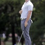 
              Rory McIlroy, of Northern Ireland, reacts after missing a birdie putt on the third hole during the third round of the Wells Fargo Championship golf tournament at Quail Hollow Club in Charlotte, N.C., Saturday, May 16, 2015. (AP Photo/Chuck Burton)
            