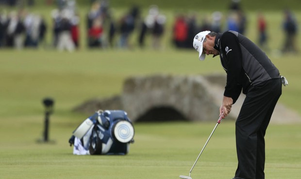 Scotland Paul Lawrie putts on the 17th green during the first round of the British Open Golf Champi...