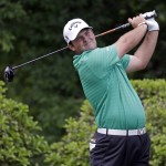 
              Patrick Reed watches his tee shot on the fifth hole during the first round of the Wells Fargo Championship golf tournament at Quail Hollow Club in Charlotte, N.C., Thursday, May 14, 2015. (AP Photo/Bob Leverone)
            