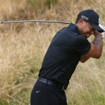 
              Tiger Woods reacts to his tee shot on the eighth hole during the first round of the U.S. Open golf tournament at Chambers Bay on Thursday, June 18, 2015 in University Place, Wash. (AP Photo/Matt York)
            