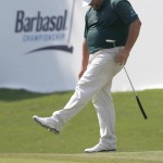 
              Jason Gore reacts after missing a putt on the 18th green during the third round of the Barbasol Championship golf tournament, Saturday, July 18, 2015, in Opelika, Ala. (AP Photo/Butch Dill)
            