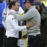 
              United States’ Zach Johnson, left, is congratulated by United States’ Jordan Spieth after winning a playoff after the final round of the British Open Golf Championship at the Old Course, St. Andrews, Scotland, Monday, July 20, 2015. (AP Photo/David J. Phillip)
            
