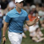 
              Rory McIlroy, of Northern Ireland, acknowledges the crowd after making a birdie putt on the fifth hole during the final round of the Wells Fargo Championship golf tournament at Quail Hollow Club in Charlotte, N.C., Sunday, May 17, 2015. (AP Photo/Chuck Burton)
            