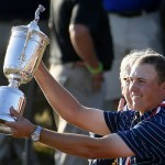 
              Jordan Spieth holds up the trophy after winning the  U.S. Open golf tournament at Chambers Bay on Sunday, June 21, 2015 in University Place, Wash. (AP Photo/Matt York)
            