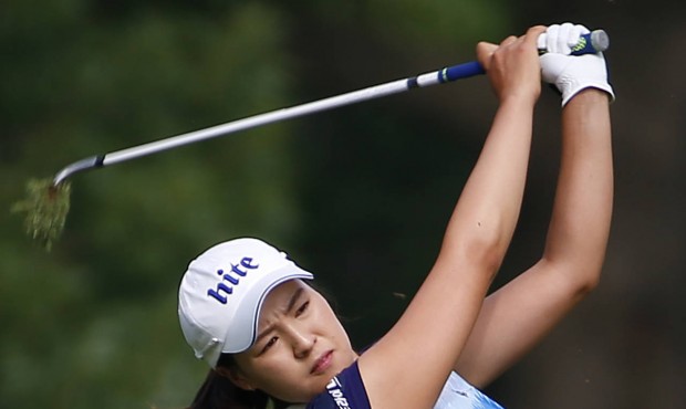 In Gee Chun hits an approach shot off the 13th fairway during the final round of the U.S. Women&#82...