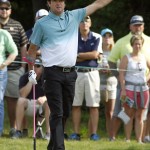 
              Bubba Watson points to the gallery that his ball is going left after his tee shot on the 13th hole during the second round of the Travelers Championship golf tournament, Friday, June 26, 2015, in Cromwell, Conn. (AP Photo/Stew Milne)
            