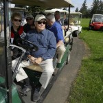 
              Golfer Jack Nicklaus, front right, and his wife Barbara, left, pause while driving a golf cart, Tuesday, June 16, 2015, at the American Lake Veterans Golf Course in Tacoma, Wash. Nicklaus was inspecting the progress of the "Nicklaus Nine," nine new golf holes designed by Nicklaus as a donation to the course, which provides military veterans with both rehabilitation and recreation through golf. (AP Photo/Ted S. Warren)
            