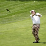 
              Mark Calcavecchia hits on the third fairway during the final round of the Champions Tour's Principal Charity Classic golf tournament, Sunday, June 7, 2015, in Des Moines, Iowa. (AP Photo/Charlie Neibergall)
            