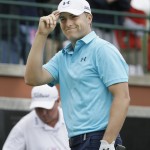 
              Jordan Spieth tips his hat to the gallery after his introduction before his tee shot on the first hole during the first round of the Colonial golf tournament, Thursday, May 21, 2015, in Fort Worth, Texas. (AP Photo/LM Otero)
            