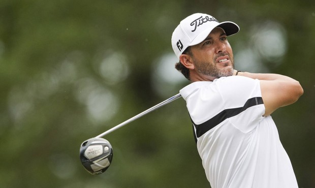 Scott Piercy tees off on the fourth hole during the final round of the Barbasol Championship golf t...