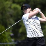 
              Karrie Webb of Australia tees off from the third hole during the third round of the KPMG Women's PGA golf championship at Westchester Country Club on Saturday, June 13, 2015, in Harrison, N.Y. (AP Photo/Kathy Kmonicek)
            