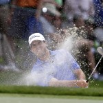 
              Ben Martin hits from a sand trap on the fifth hole during the first round of the Wells Fargo Championship golf tournament at Quail Hollow Club in Charlotte, N.C., Thursday, May 14, 2015. (AP Photo/Bob Leverone)
            