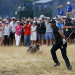 
              Tiger Woods watches his shot from the fairway on the sixth hole during the first round of the U.S. Open golf tournament at Chambers Bay on Thursday, June 18, 2015 in University Place, Wash. (AP Photo/Matt York)
            