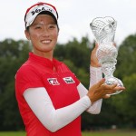 
              Chella Choi, of South Korea, holds her trophy after winning the Marathon Classic golf tournament on the first playoff hole at Highland Meadows Golf Club in Sylvania, Ohio, Sunday, July 19, 2015. (AP Photo/Rick Osentoski)
            