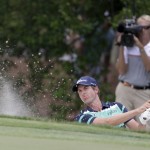 
              Webb Simpson hits from a sand trap on the fourth hole during the final round of the Wells Fargo Championship golf tournament at Quail Hollow Club in Charlotte, N.C., Sunday, May 17, 2015. (AP Photo/Bob Leverone)
            