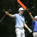 
              Ben Crane, left, gestures for his errant tee shot on the seventh hole during the first round of the St. Jude Classic golf tournament Thursday, June 11, 2015, in Memphis, Tenn. Crane bogeyed the hole. (AP Photo/Mark Humphrey)
            