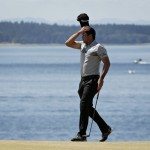 
              Jason Day, of Australia, reacts after missing his par putt on the second hole during the third round of the U.S. Open golf tournament at Chambers Bay on Saturday, June 20, 2015 in University Place, Wash. (AP Photo/Charlie Riedel)
            