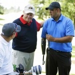 
              Golfer Jack Nicklaus, center, talks with disabled golfers Leroy Petry, right, and Aaron Boyle, left, Tuesday, June 16, 2015 at American Lake Veterans Golf Course in Tacoma, Wash. Petry received the Medal of Honor in 2011 for for saving the lives of fellow soldiers when he picked up a grenade in Afghanistan, losing his hand in the process. Nicklaus was at the course to inspect the progress of the "Nicklaus Nine," nine new golf holes designed by Nicklaus as a donation to the course, which provides military veterans with both rehabilitation and recreation through golf. (AP Photo/Ted S. Warren)
            